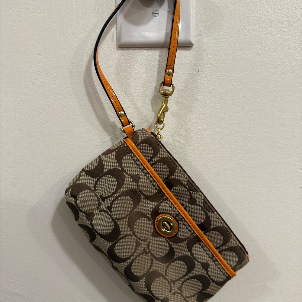 Coach Brown and Tan Wristlet with Orange Accents